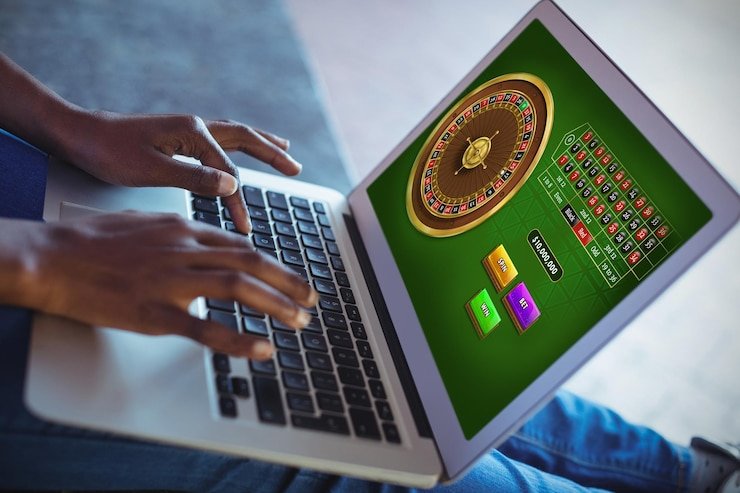 Ponsel menampilkan kartu Blackjack MH